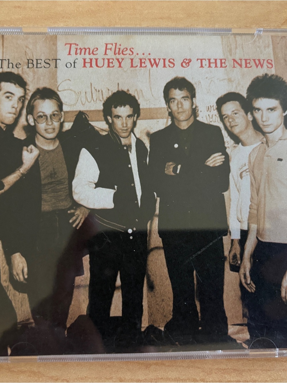 Time Flies: The Best of Huey Lewis & The News CD - Sepia Cover